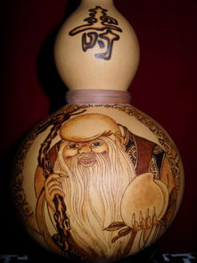 匠心傳承 烙畫葫蘆與壽星茶罐的藝術(shù)魅力